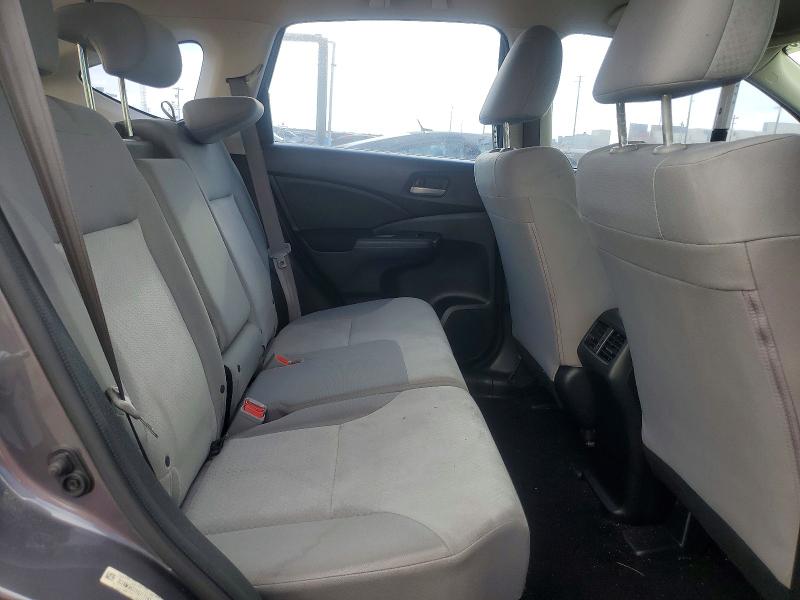 Photo 11 from auction – 2015 HONDA CR-V with VIN 3CZRM3H31FG717193