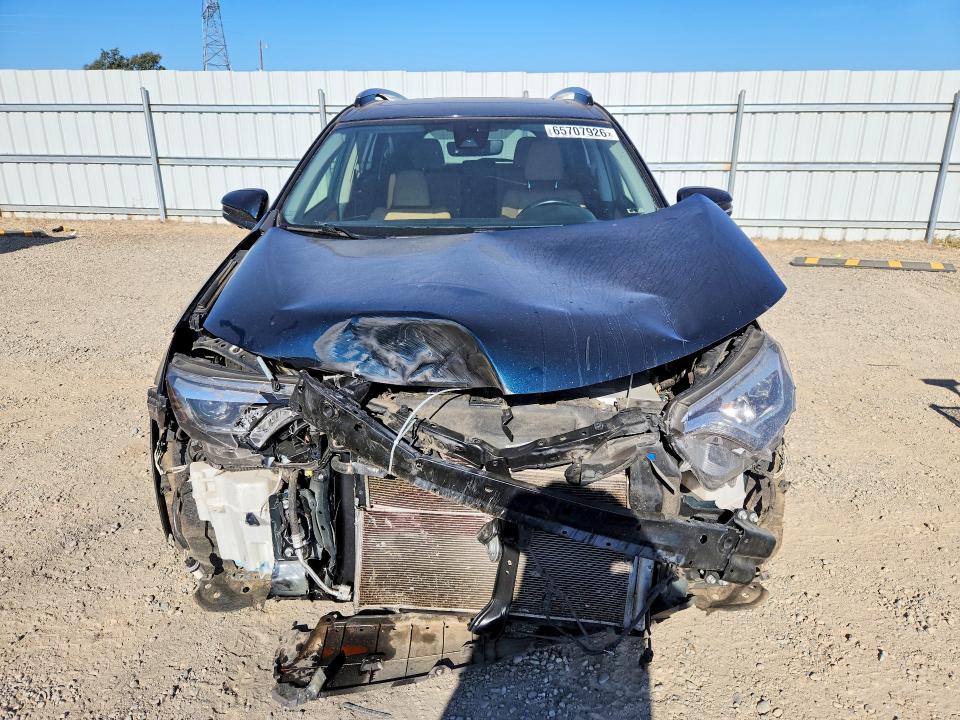 Photo 5 from auction – 2018 TOYOTA RAV4 HV with VIN JTMDJREV6JD237772