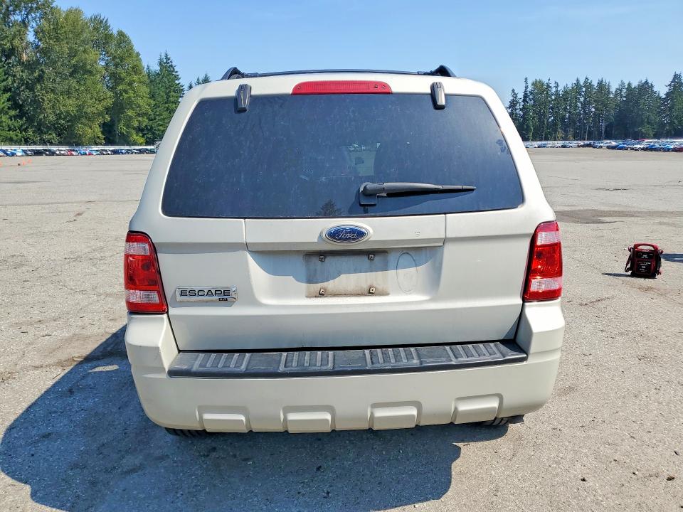 Photo 6 from auction – 2009 FORD ESCAPE with VIN 1FMCU03709KD00080