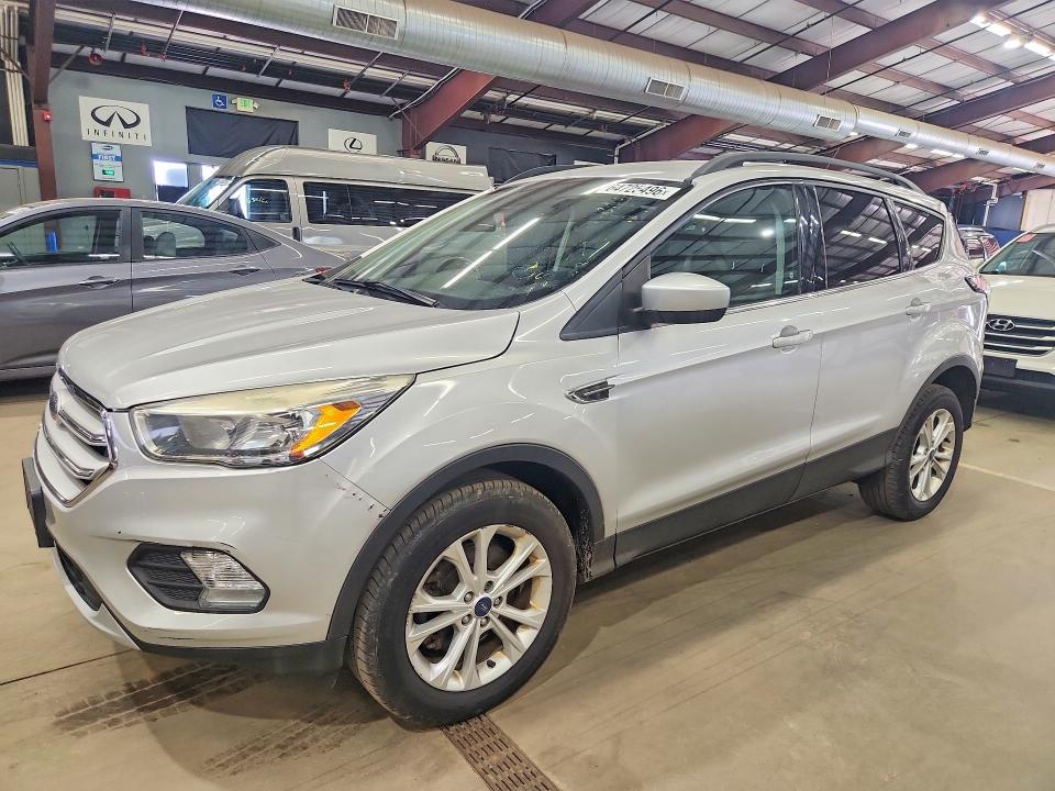 FORD ESCAPE 2018 with VIN 1FMCU9GD2JUA75321 - Photo from auction