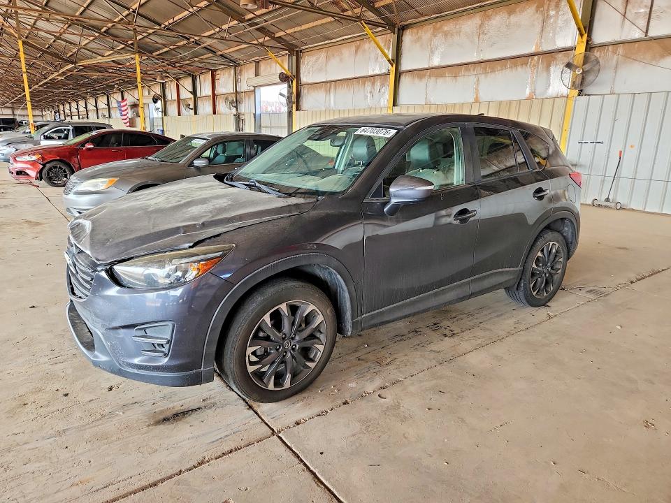 MAZDA CX-5 2016 с VIN JM3KE2DY0G0874629 - Фото с аукциона