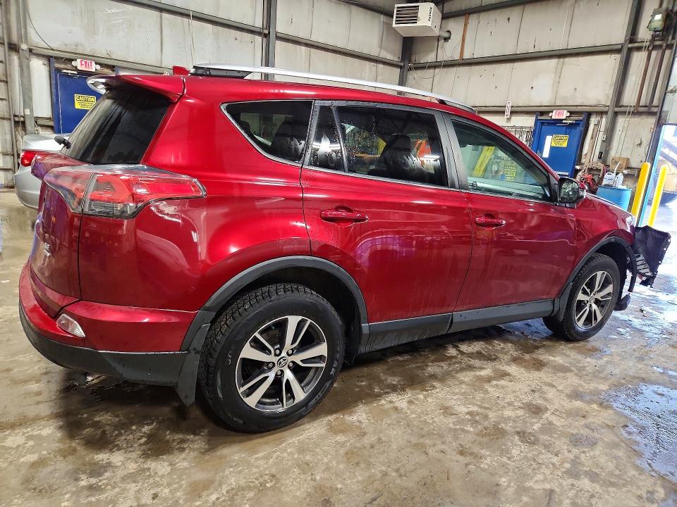 Photo 3 from auction – 2018 TOYOTA RAV4 with VIN 2T3BFREV3JW853229