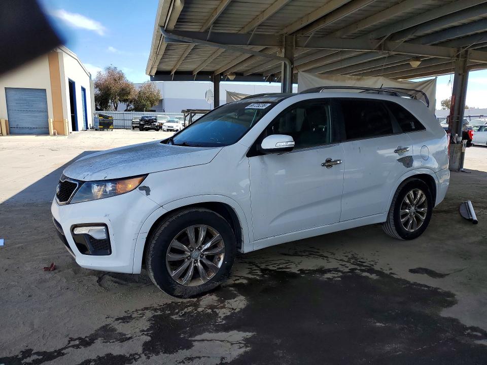 KIA SORENTO 2011 with VIN 5XYKW4A24BG092452 - Photo from auction