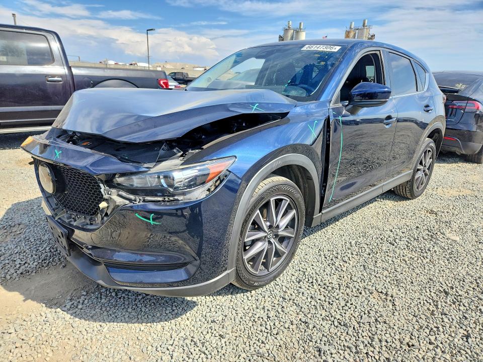 MAZDA CX-5 2018 with VIN JM3KFACM7J1473036 - Photo from auction