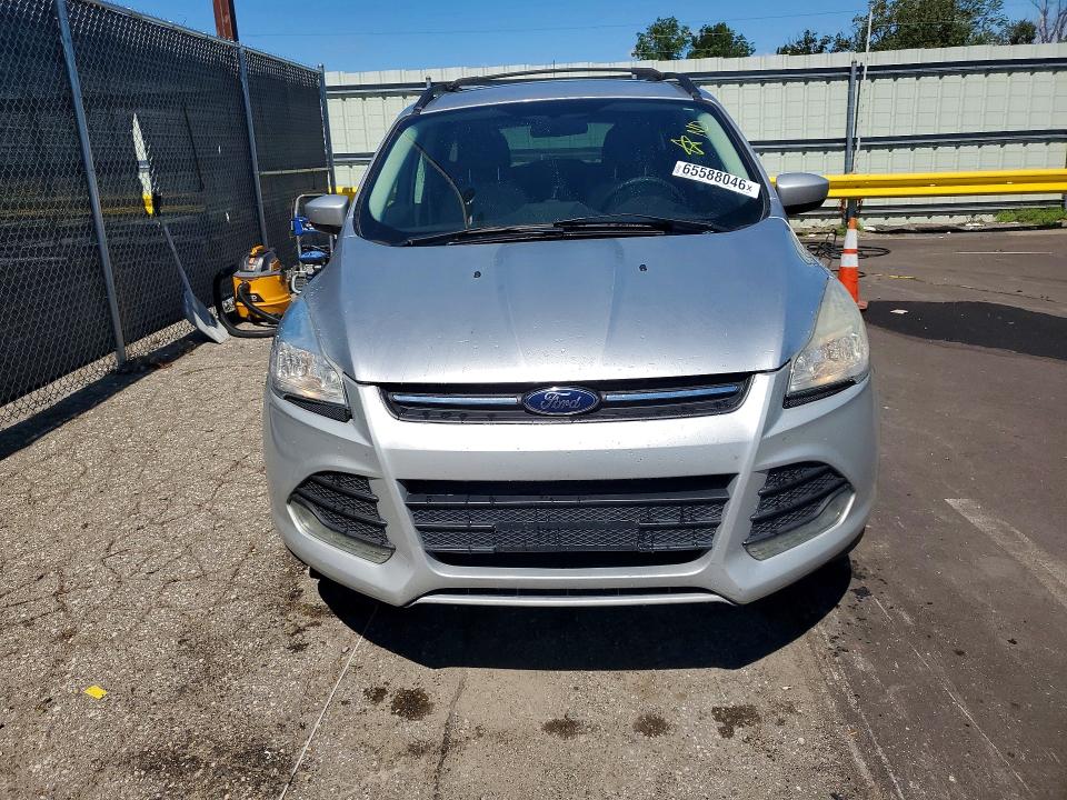 Photo 5 from auction – 2014 FORD ESCAPE with VIN 1FMCU9GX6EUA48624