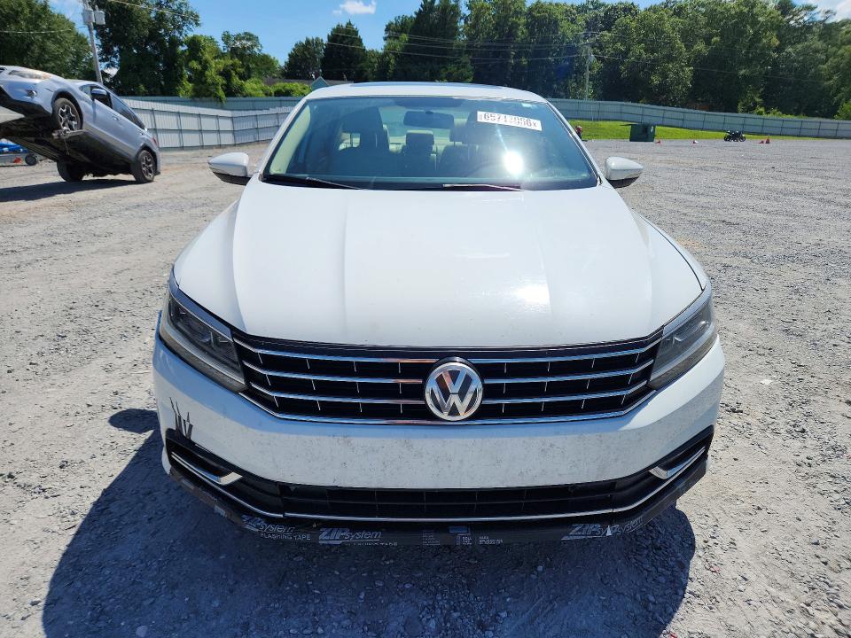 Photo 5 from auction – 2016 VOLKSWAGEN PASSAT with VIN 1VWBS7A39GC053435