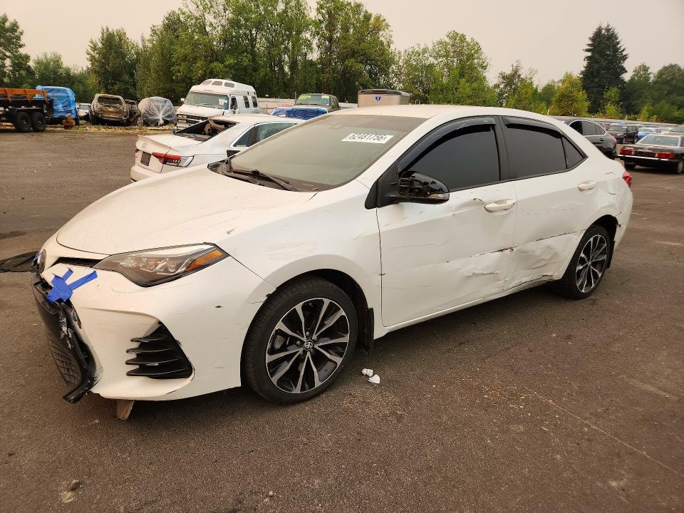 TOYOTA COROLLA 2017 with VIN 5YFBURHE3HP613359 - Photo from auction