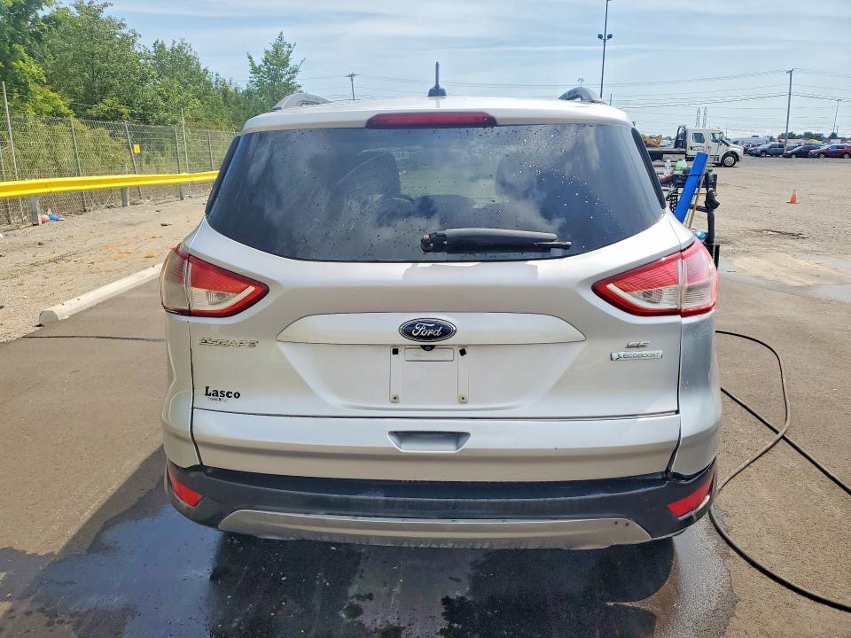 Photo 6 from auction – 2015 FORD ESCAPE with VIN 1FMCU9G9XFUA47270