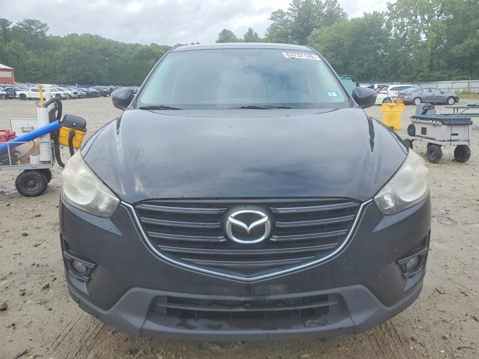Photo 5 from auction – 2016 MAZDA CX-5 with VIN JM3KE4CYXG0779590