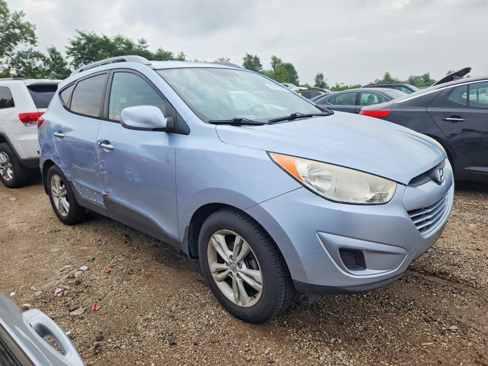 Photo 4 from auction – 2011 HYUNDAI TUCSON with VIN KM8JU3AC9BU159027