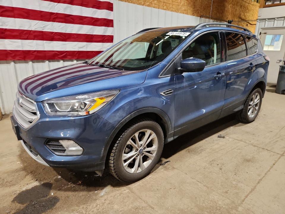 FORD ESCAPE 2018 with VIN 1FMCU9HD3JUC10417 - Photo from auction