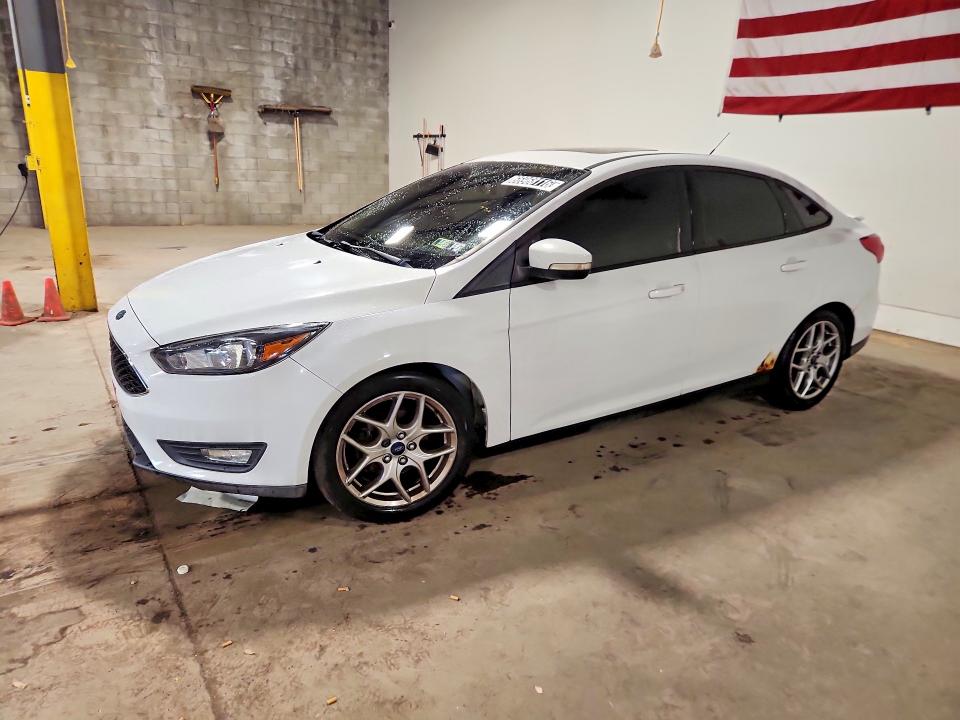 FORD FOCUS 2015 with VIN 1FADP3F20FL245174 - Photo from auction