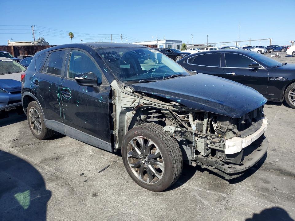 Photo 4 from auction – 2016 MAZDA CX-5 with VIN JM3KE2DY4G0815311