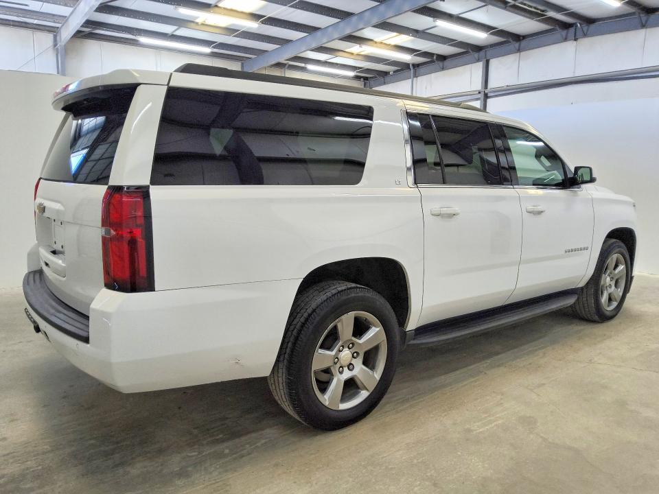 Photo 3 from auction – 2020 CHEVROLET SUBURBAN with VIN 1GNSCHKC3LR276105