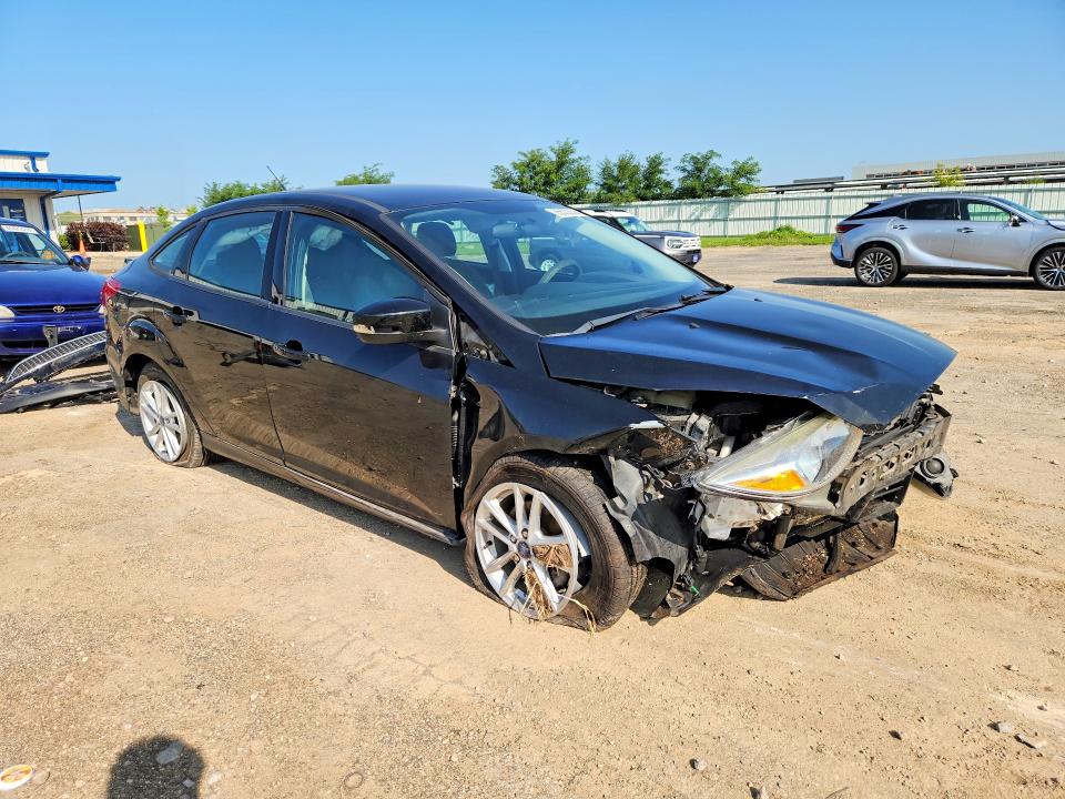 Photo 4 from auction – 2017 FORD FOCUS with VIN 1FADP3F25HL205885