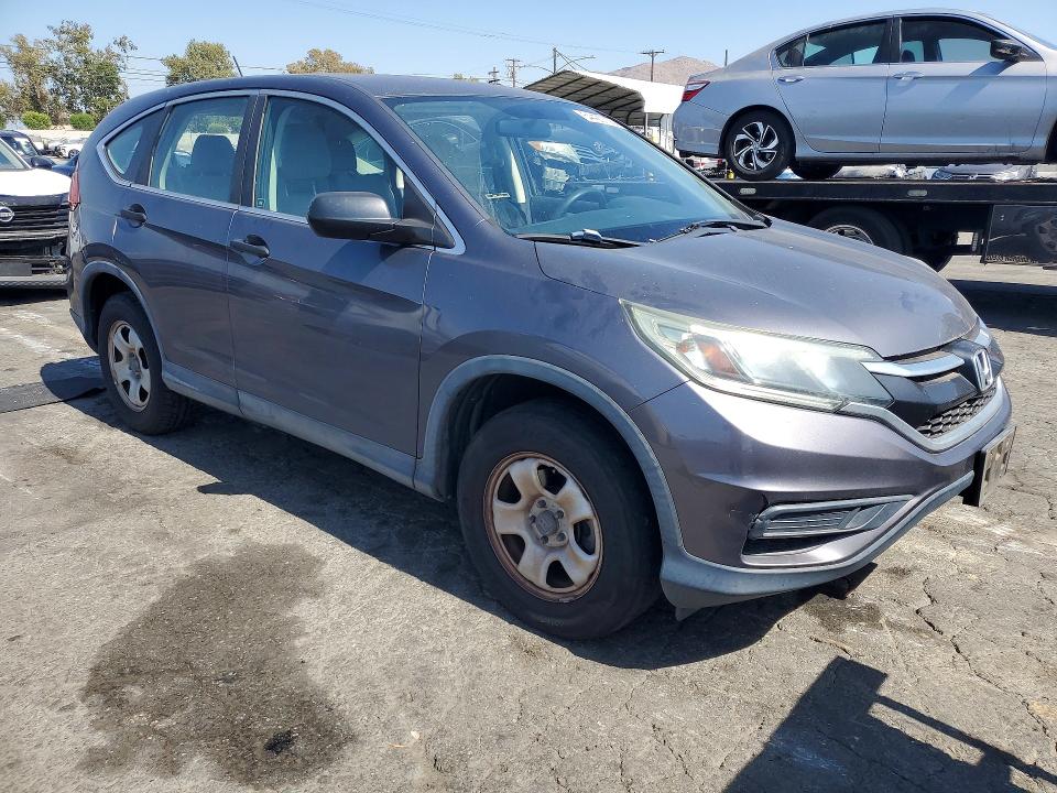 Photo 4 from auction – 2015 HONDA CR-V with VIN 3CZRM3H30FG700580