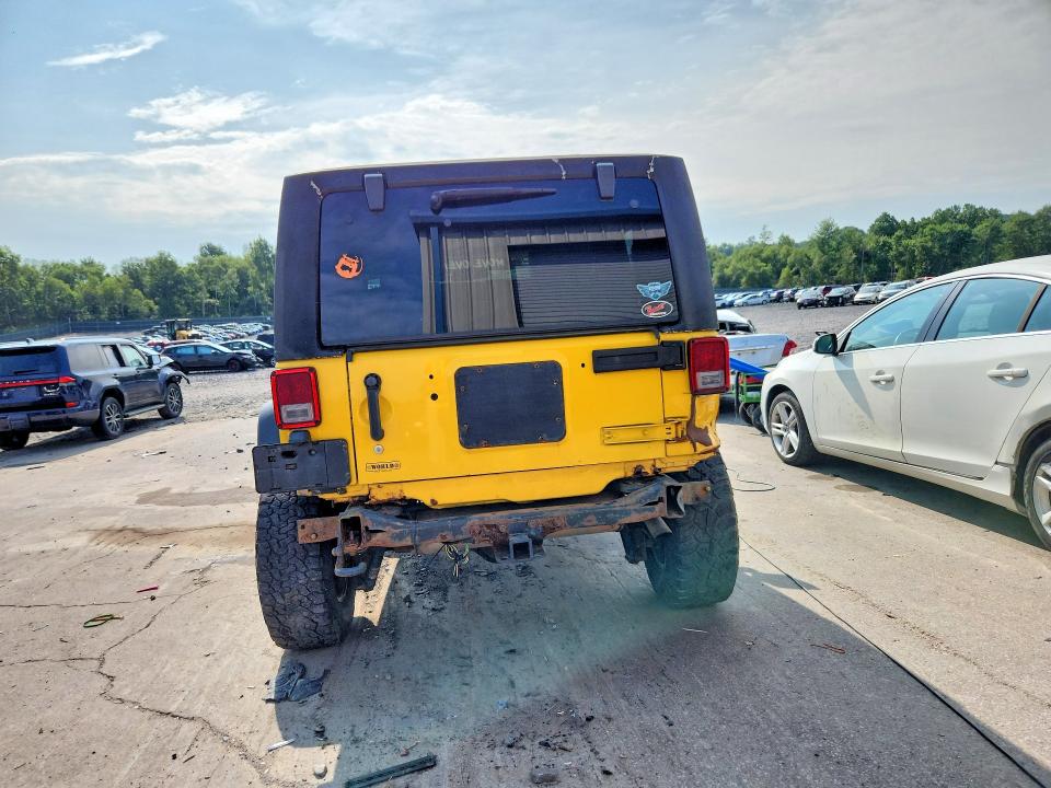 Photo 6 from auction – 2009 JEEP WRANGLER with VIN 1J4FA24109L741146