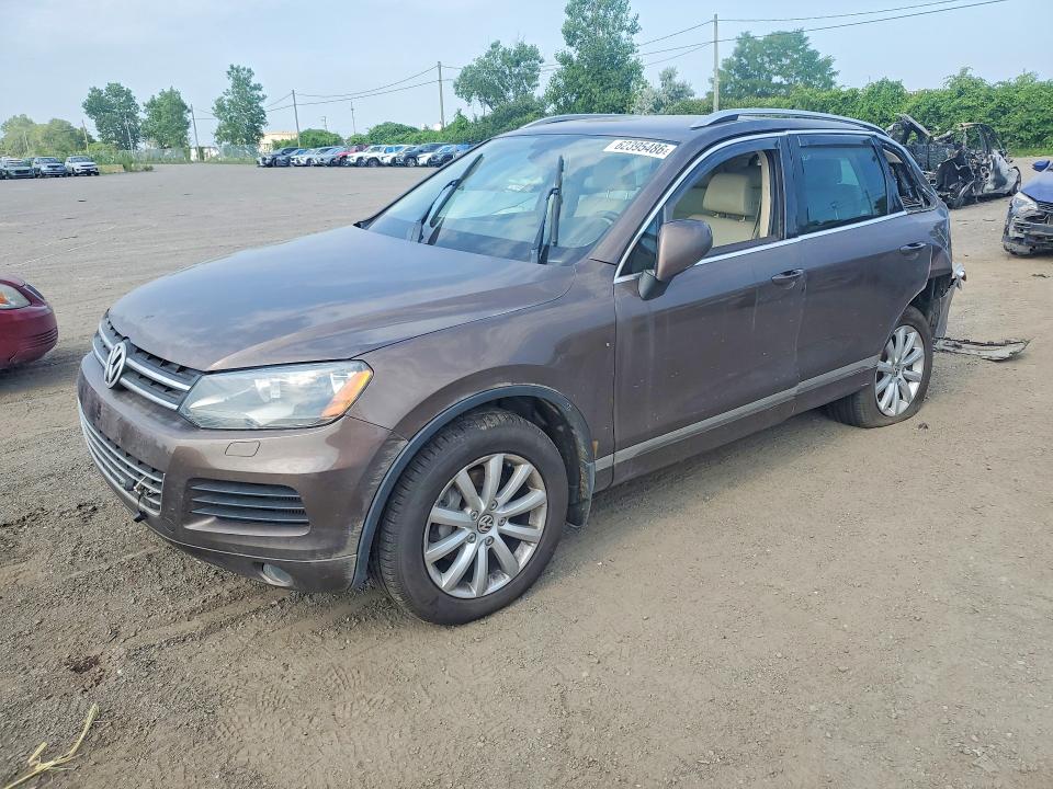 VOLKSWAGEN TOUAREG 2011 with VIN WVGFK9BP8BD005182 - Photo from auction