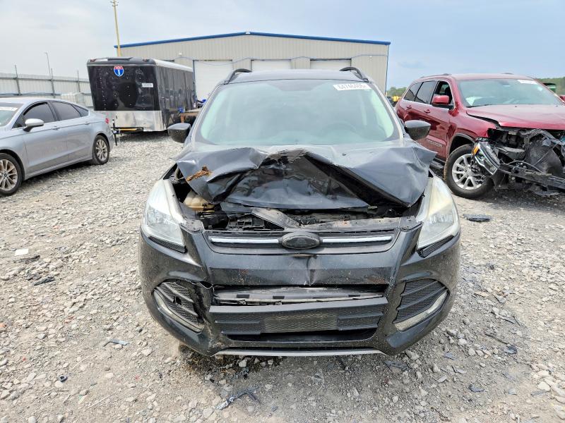 Photo 12 from auction – 2015 FORD ESCAPE with VIN 1FMCU0GX7FUB94284
