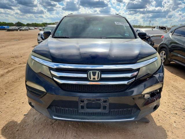Photo 5 from auction – 2016 HONDA PILOT with VIN 5FNYF5H98GB027251