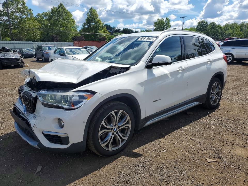 BMW X1 2017 with VIN WBXHT3Z35H4A65557 - Photo from auction