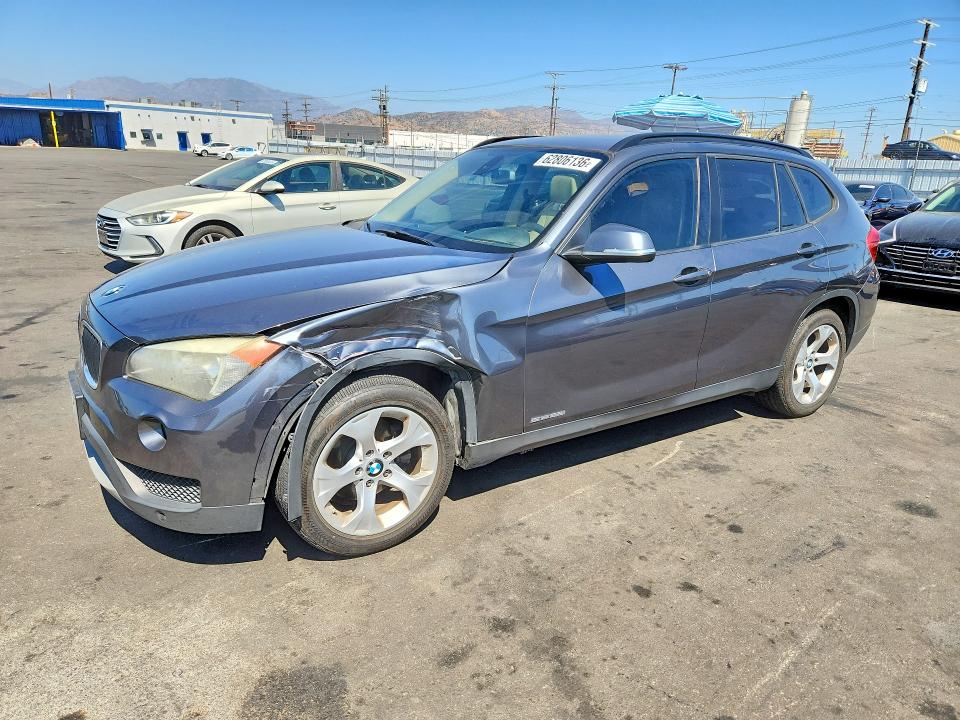 BMW X1 2014 with VIN WBAVM1C5XEVW50517 - Photo from auction