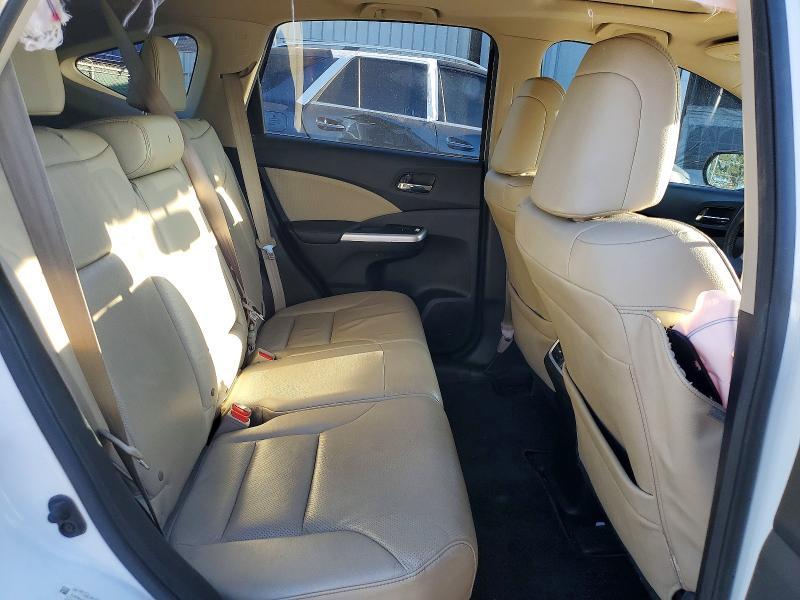 Photo 11 from auction – 2015 HONDA CR-V with VIN 5J6RM4H72FL064157