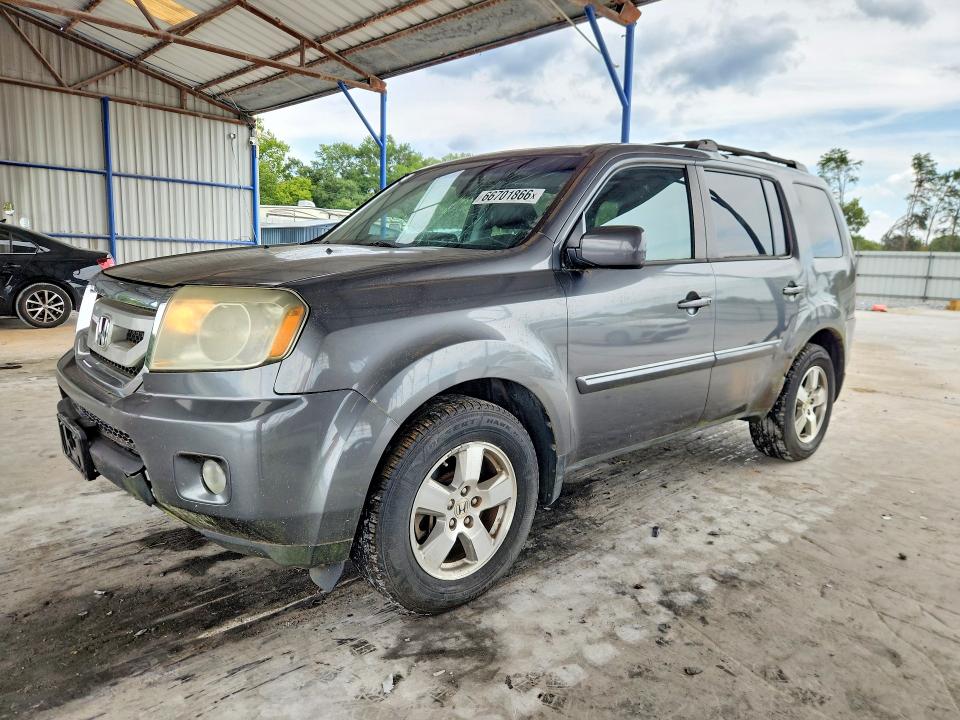 HONDA PILOT 2011 with VIN 5FNYF4H71BB059699 - Photo from auction