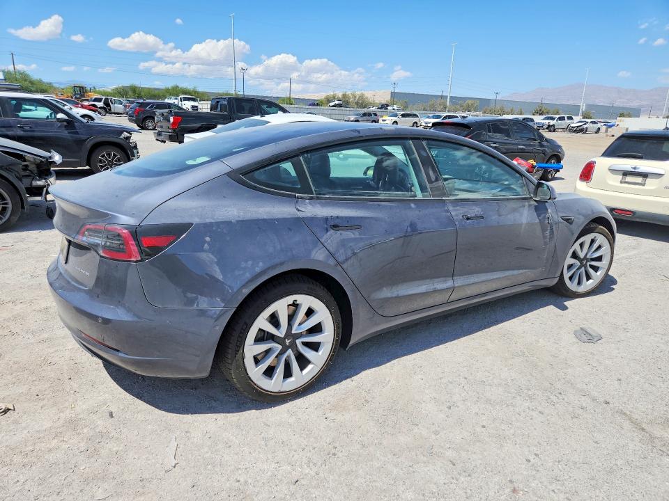 Снимка 3 от търг – 2022 TESLA MODEL 3 с VIN 5YJ3E1EB5NF110050