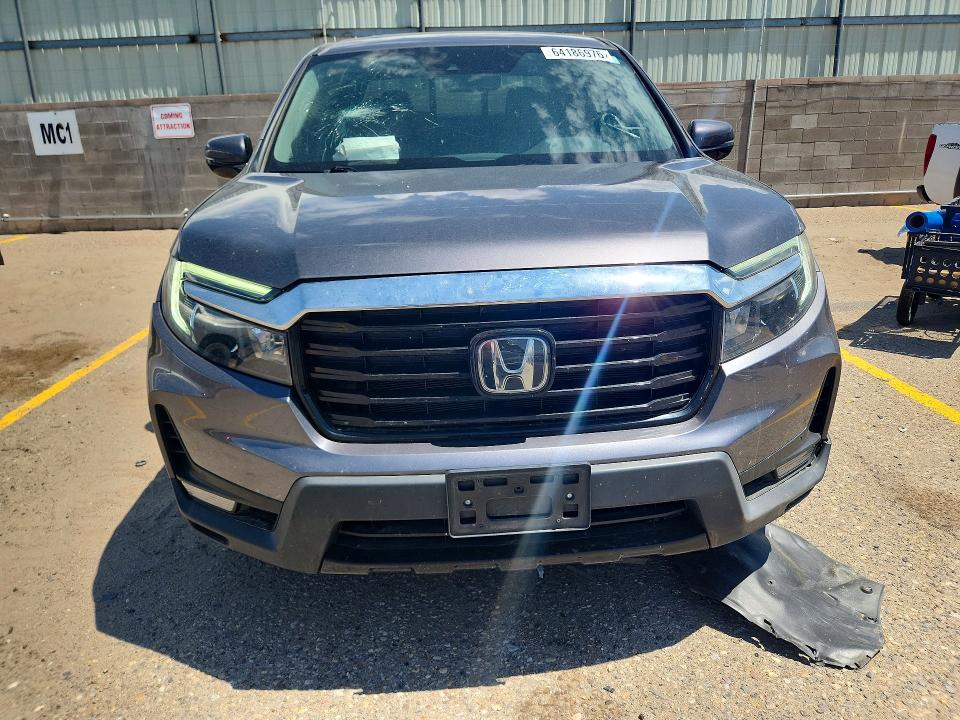 Photo 5 from auction – 2022 HONDA RIDGELINE with VIN 5FPYK3F78NB014831