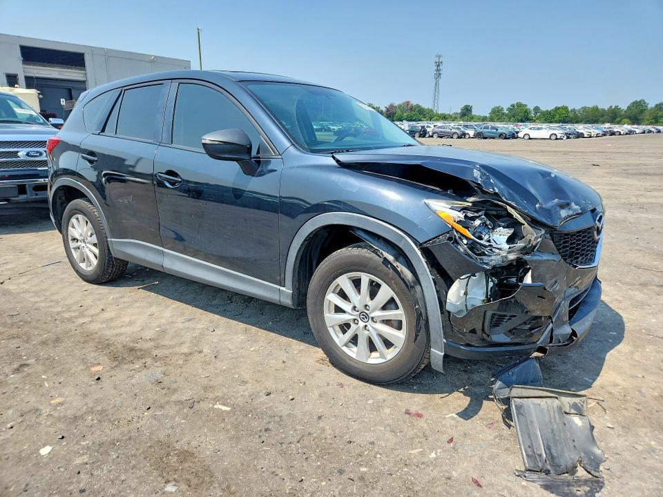 Photo 4 from auction – 2015 MAZDA CX-5 with VIN JM3KE2BEXF0472950