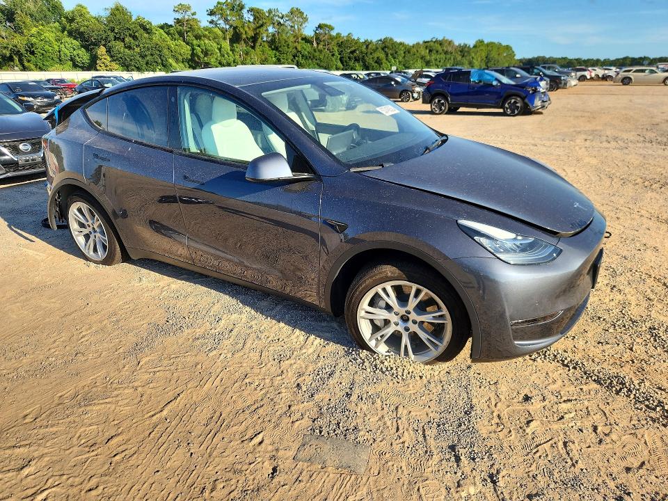 Photo 4 from auction – 2022 TESLA MODEL Y with VIN 7SAYGAEEXNF323170