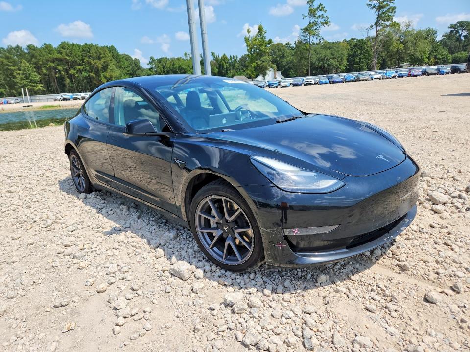 Photo 4 from auction – 2022 TESLA MODEL 3 with VIN 5YJ3E1EA2NF370218