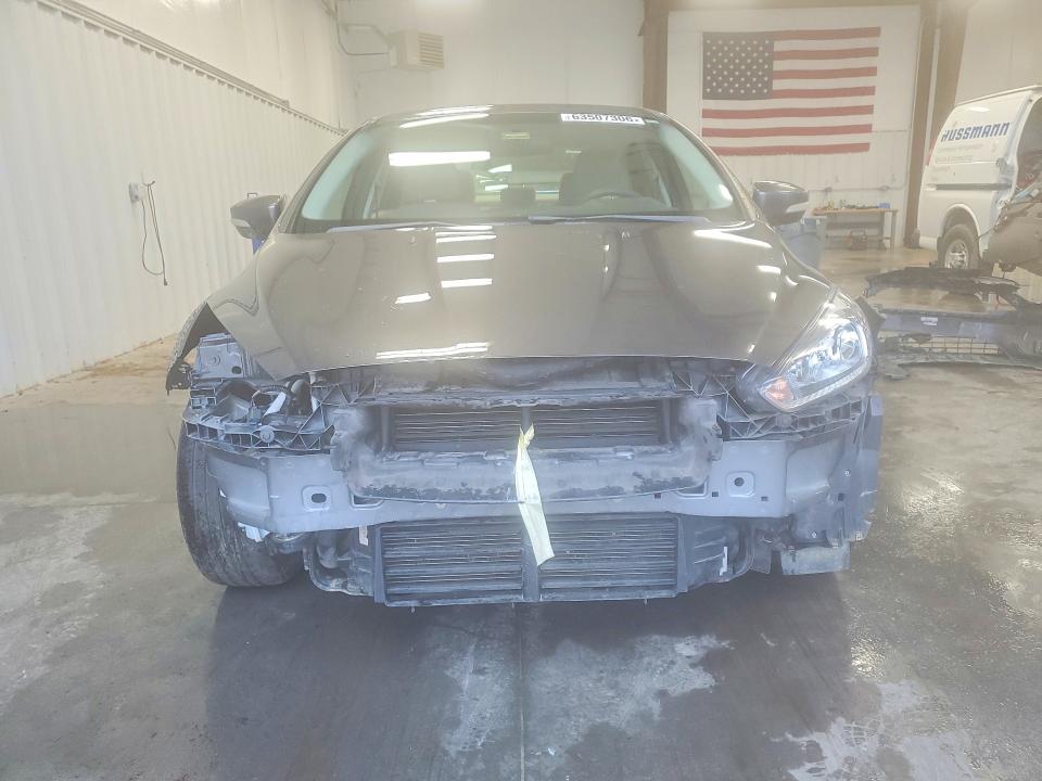 Photo 5 from auction – 2015 FORD FOCUS with VIN 1FADP3F23FL226540