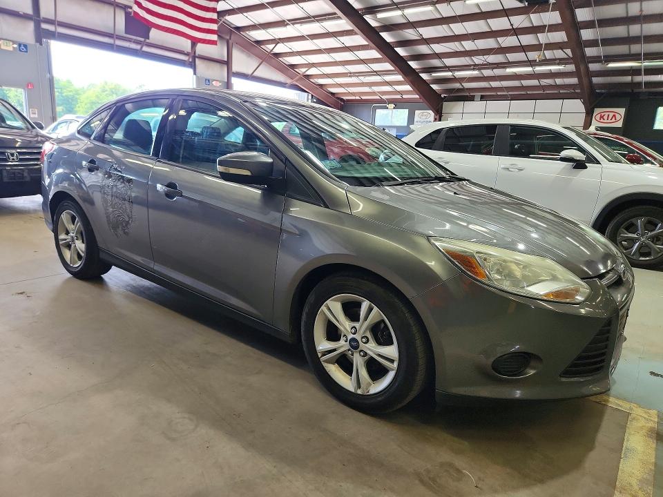 Photo 4 from auction – 2014 FORD FOCUS with VIN 1FADP3F20EL454719
