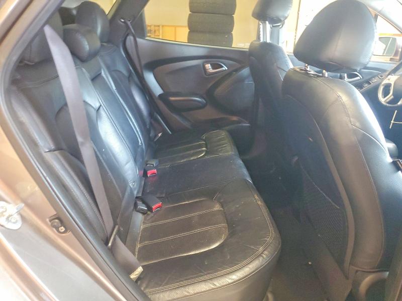 Photo 11 from auction – 2010 HYUNDAI TUCSON with VIN KM8JUCAC1AU047207