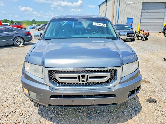 Photo 5 from auction – 2011 HONDA RIDGELINE with VIN 5FPYK1F51BB009324