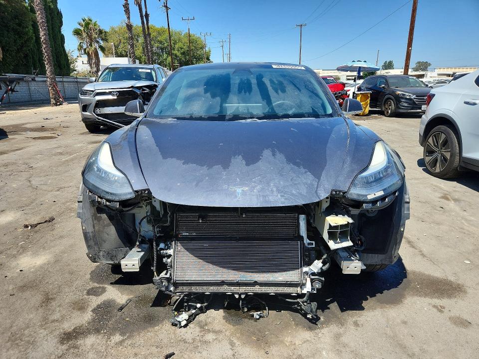 Photo 5 from auction – 2020 TESLA MODEL 3 with VIN 5YJ3E1EA4LF630454