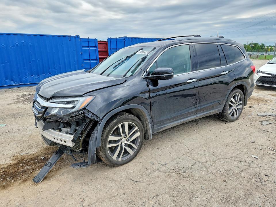 HONDA PILOT 2017 with VIN 5FNYF6H06HB055820 - Photo from auction