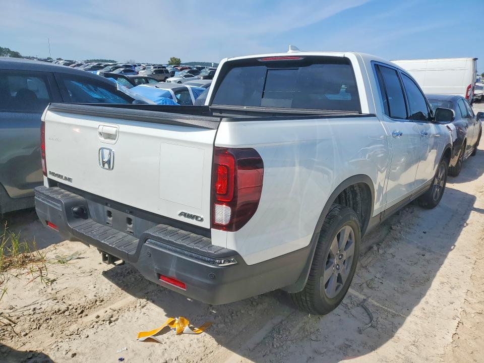 Photo 3 from auction – 2020 HONDA RIDGELINE with VIN 5FPYK3F74LB002527
