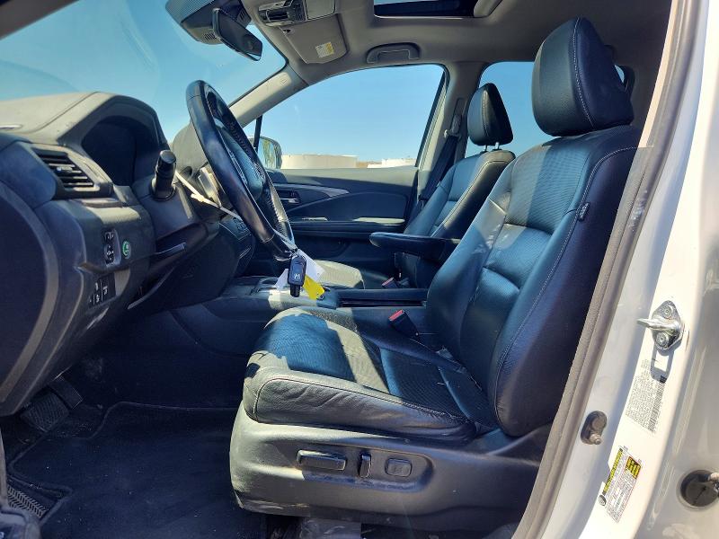 Photo 7 from auction – 2022 HONDA RIDGELINE with VIN 5FPYK3F58NB038853