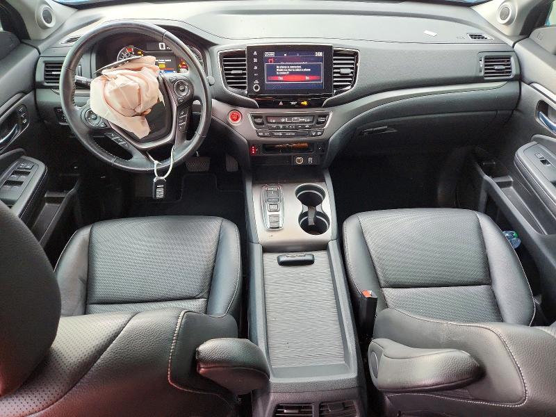 Photo 8 from auction – 2022 HONDA RIDGELINE with VIN 5FPYK3F50NB029578