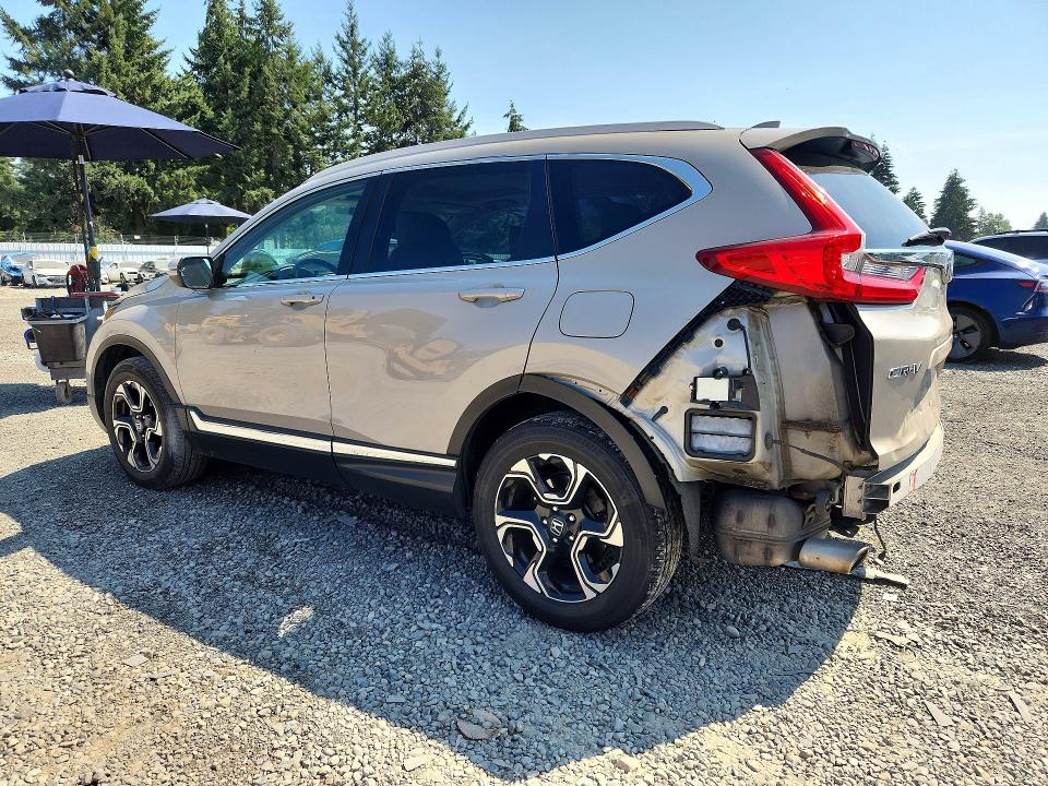 Photo 2 from auction – 2017 HONDA CR-V with VIN 5J6RW2H92HL049144