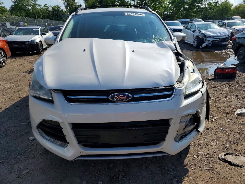 Photo 5 from auction – 2013 FORD ESCAPE with VIN 1FMCU9H98DUD06933