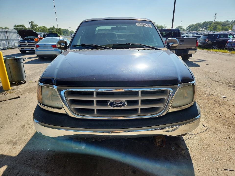Photo 5 from auction – 2002 FORD F150 with VIN 1FTRW07L92KD44035