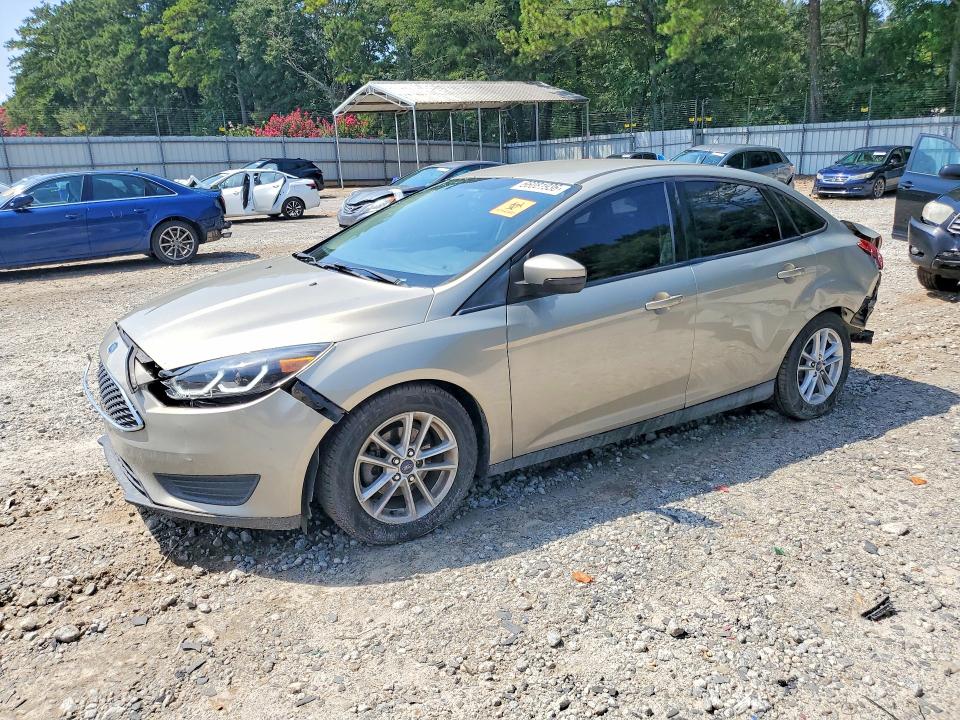 FORD FOCUS 2016 with VIN 1FADP3F23GL390968 - Photo from auction