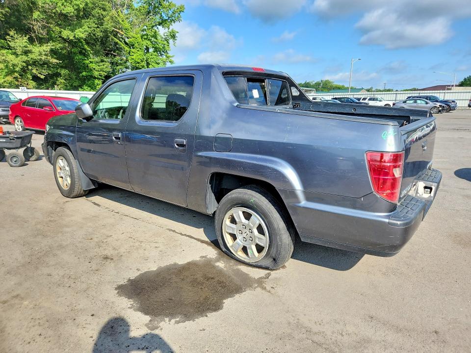 Photo 2 from auction – 2010 HONDA RIDGELINE with VIN 5FPYK1F42AB001061