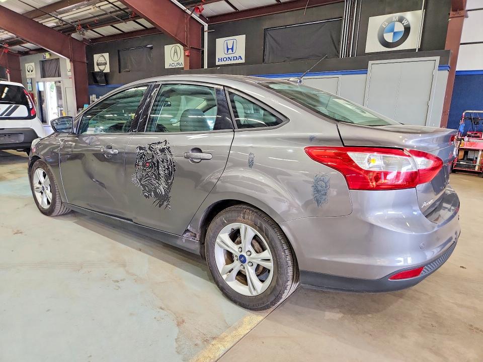 Photo 2 from auction – 2014 FORD FOCUS with VIN 1FADP3F20EL454719