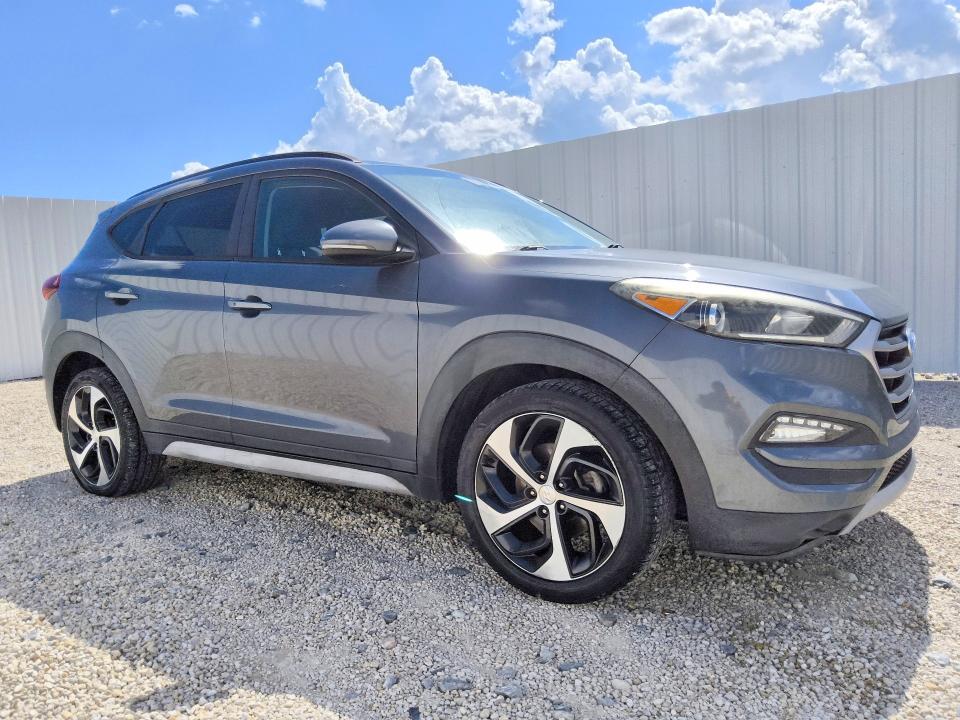 Photo 4 from auction – 2017 HYUNDAI TUCSON with VIN KM8J33A21HU559103