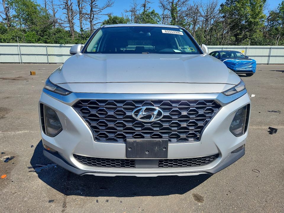 Photo 5 from auction – 2019 HYUNDAI SANTA FE with VIN 5NMS3CAD9KH099634